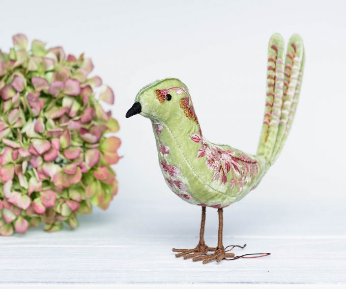Apple green silk velvet standing bird with embroidered flowers