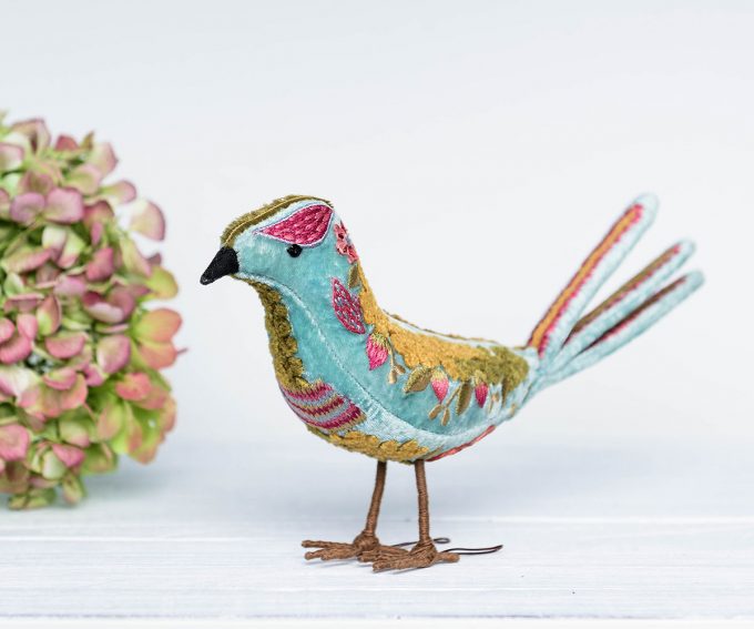 Hope bird – Light blue velvet standing bird ornament with embroidered flowers and patterns