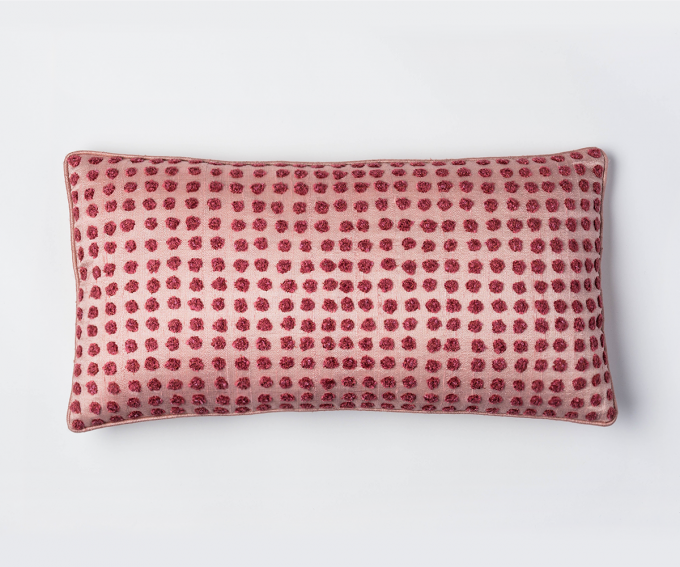 Pink polka dot silk cushion 25cm x 50cm.