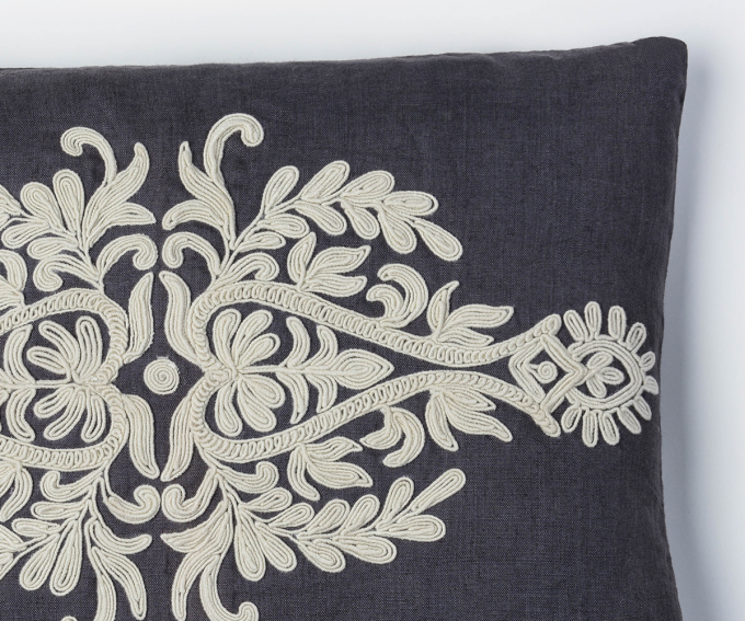 Susana cushion detail – Charcoal grey cushion with cream embroidery. Dark grey linen cushion 50mm x 30mm