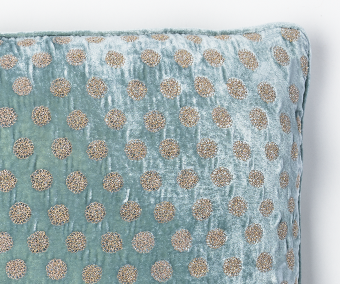 Detail of light blue silk velvet cushion with dotted pattern. 45mm x 45mm