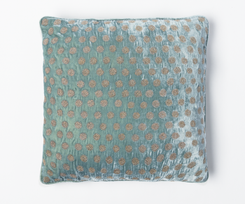 Light blue silk velvet cushion with dotted pattern.